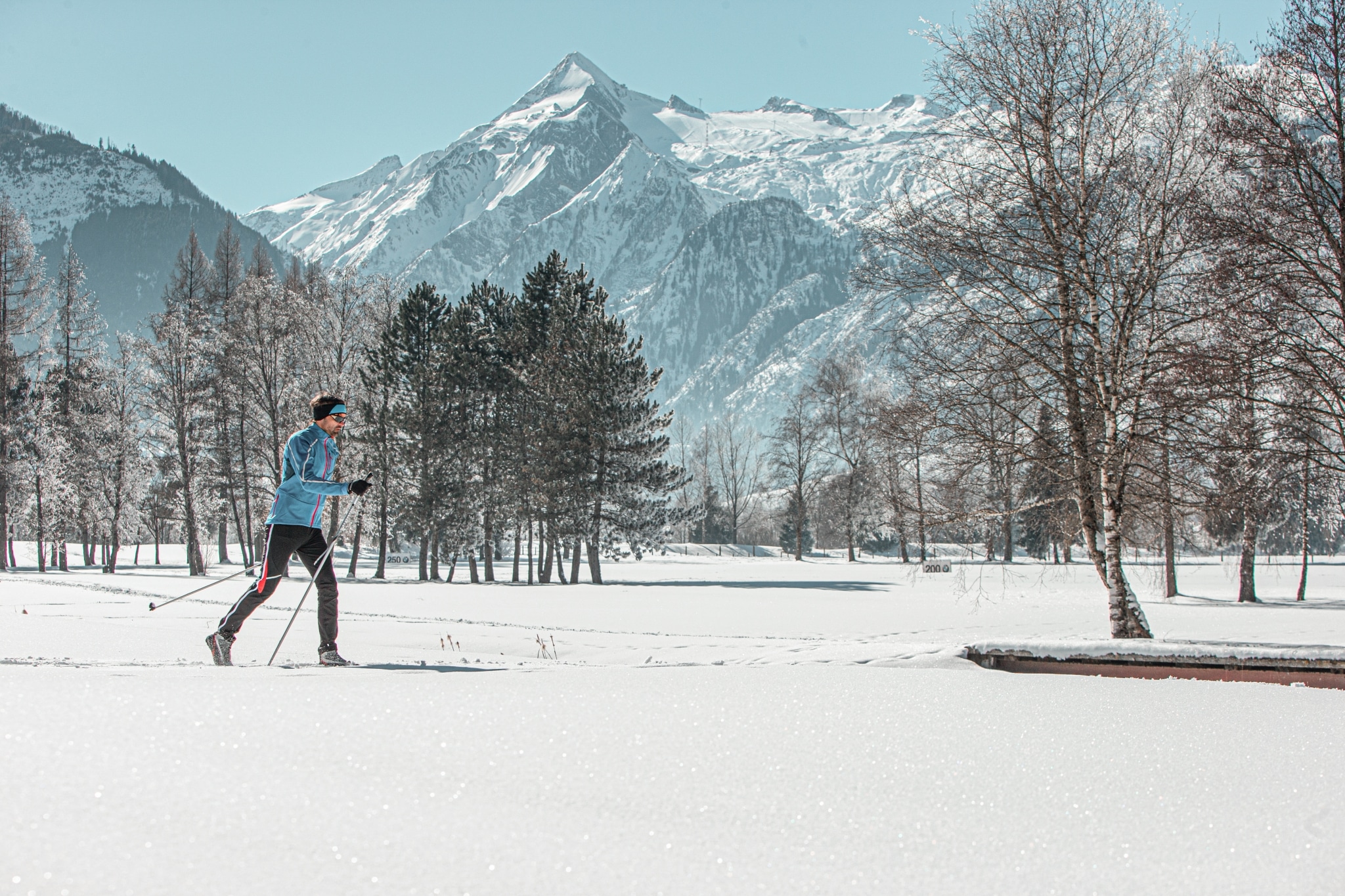 winter-langlaufen-in-toller-kulisse-2-scaled-1 Alpenhaus Kaprun - Sport, SPA & Wellness